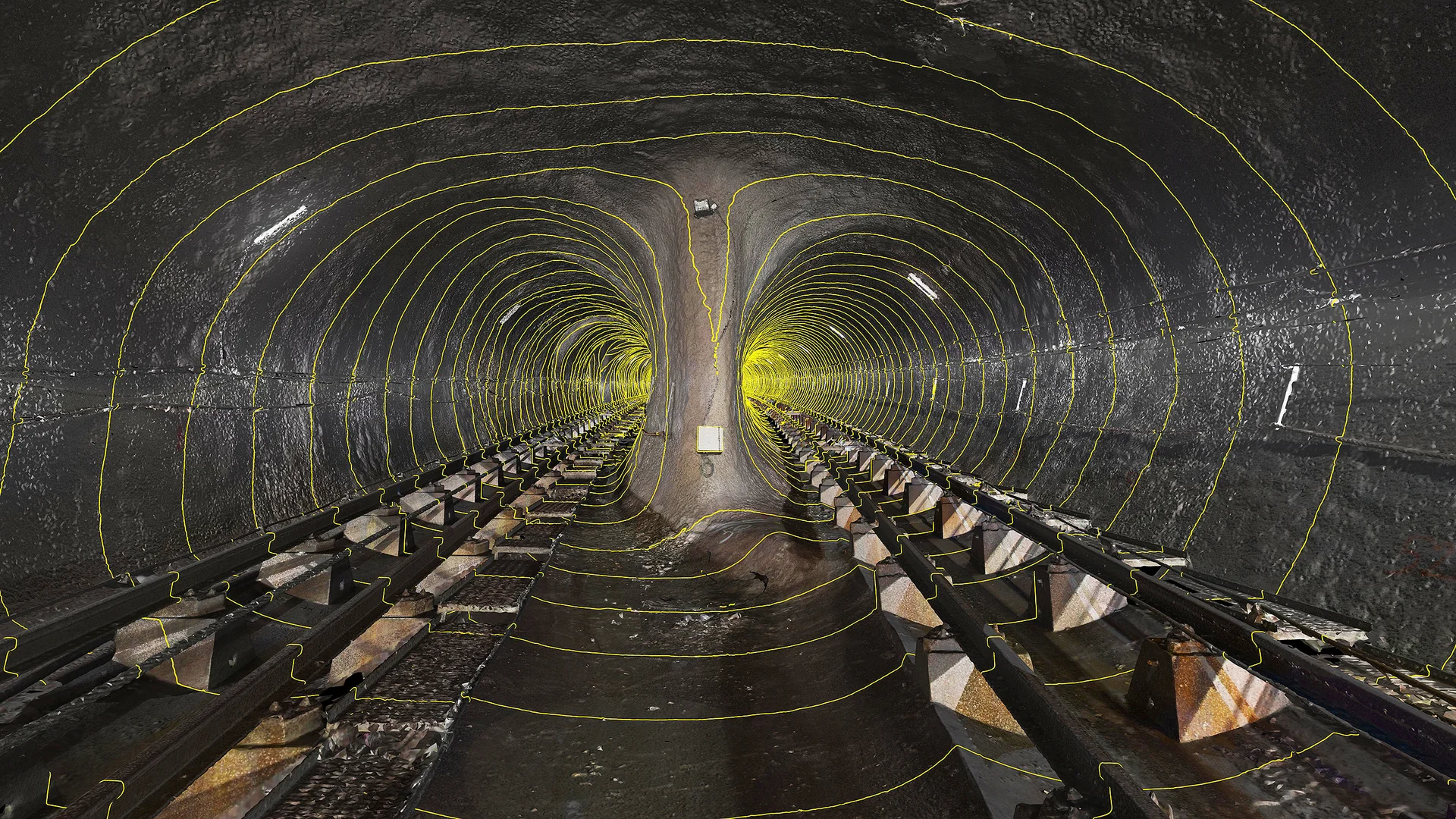 Numérisation 3D d’un tunnel ferroviaire avec affichage des profils de section le long des deux voies.